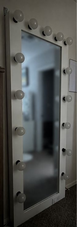 Vanity mirror with shelves