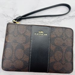 Coach Signature brown and black  Wristlet purse.