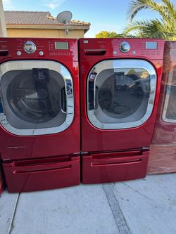 LG Tromm Washer And Dryer With Pedestals $680