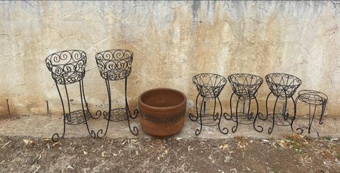 Garden planter and iron plant pot stands Pick Up Only And Cash