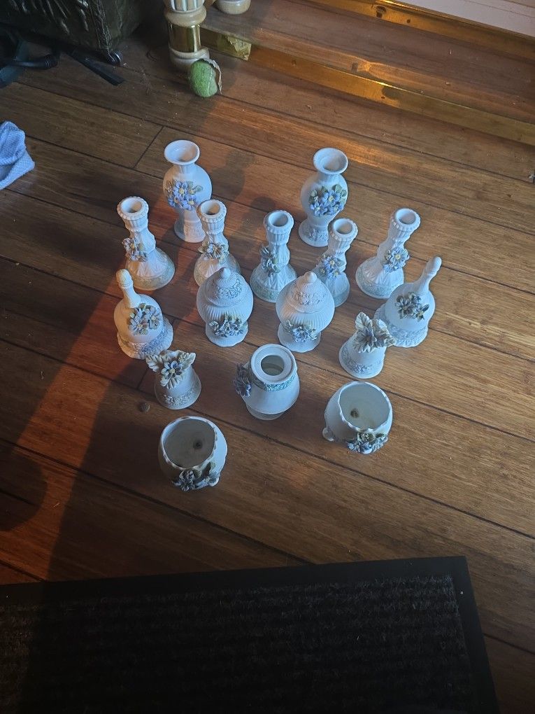 A 16 piece porcelain hand painted, set