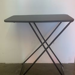 18 in. Black Plastic Adjustable Height Folding Utility Table