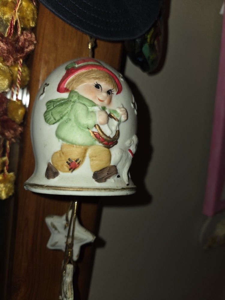 Boy Porcelain Bell Winter Stars