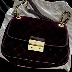 Burgundy, Michael Kors purse with gold chain