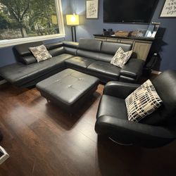 Leather 3 Pc Sectional And Storage Area  With Bonus Ottoman 