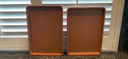 2 lightly used copper chef (1) and copper (1) baking sheets