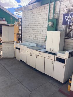 Metal kitchen cabinets and sink
