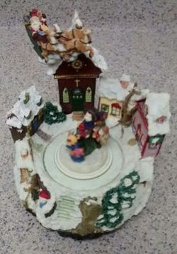 Rotating Music Box Statue