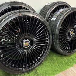 NEW 26 inch gloss black wheels with cadillac floating caps and atturo 305/30r26 tires