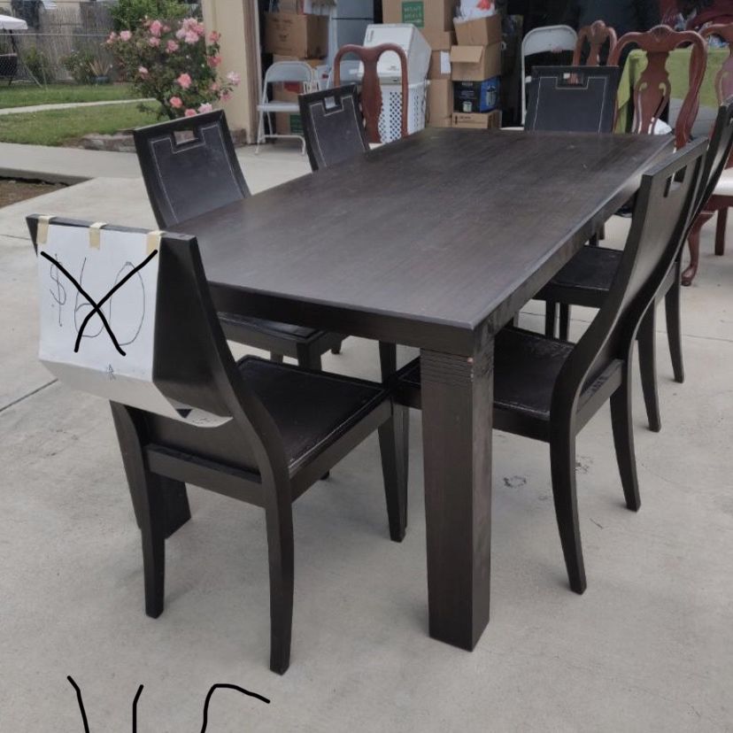 Solid Wood Dining table and 6 matching chairs 
