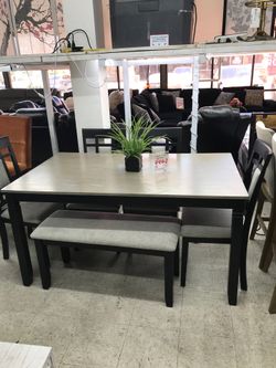 Table + 4 chairs +bench