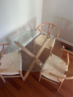 Round Glass Top Dining Table with Wishbone Chairs