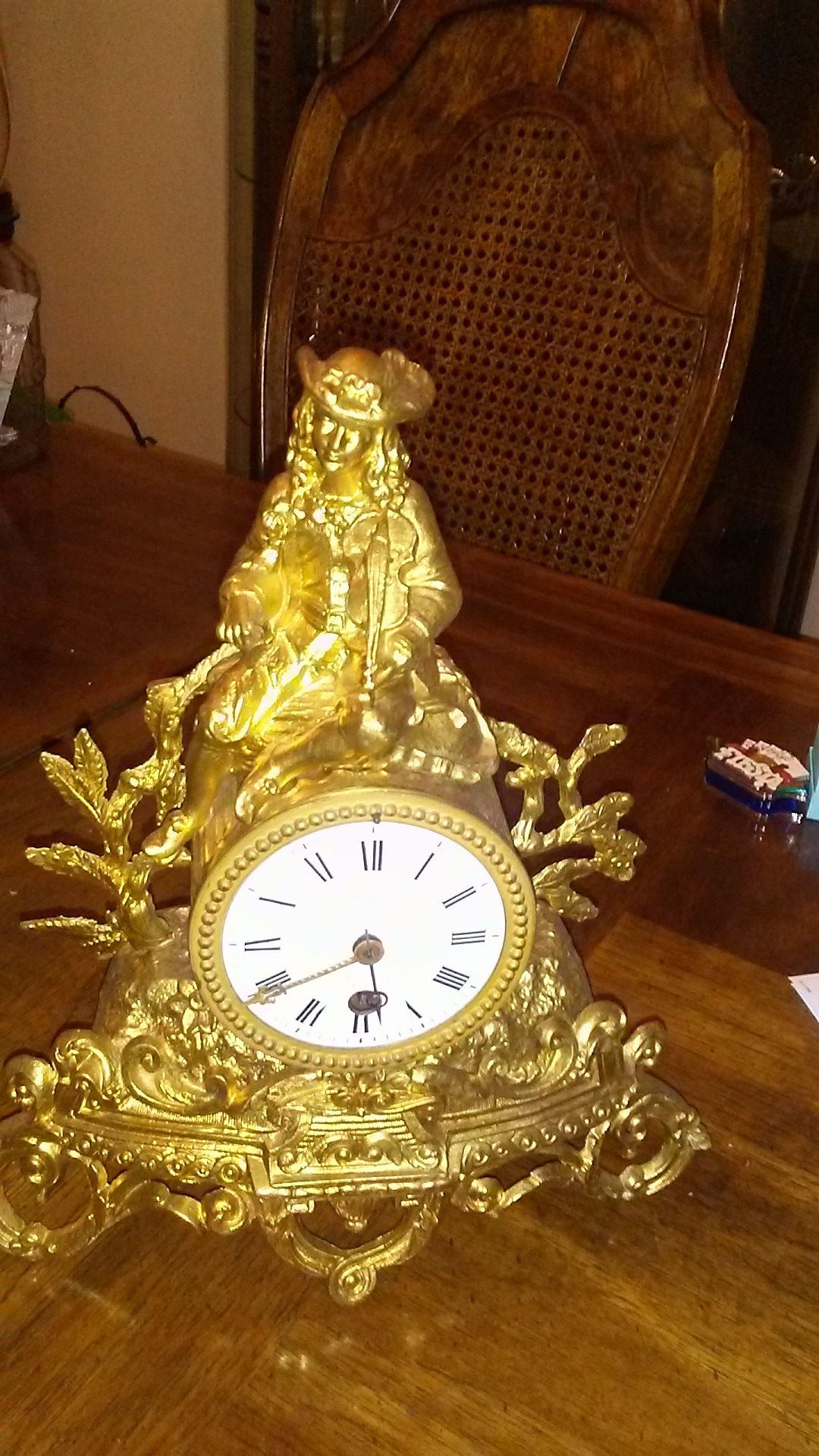 Working antique gold medal clock
