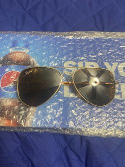 Ray Ban glasses, the lenses are brown, they are in good condition, I am asking for $35firm price