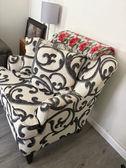 Upholstered Accent Chair with Scroll Pattern