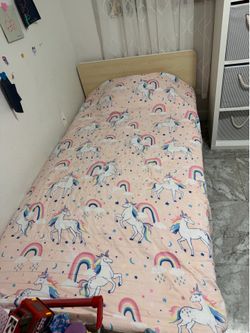 Twin bed with mattress