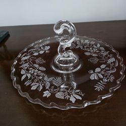 Clear glass center-handled sandwich tray with etched 'Lacy Leaf' pattern by Fostoria