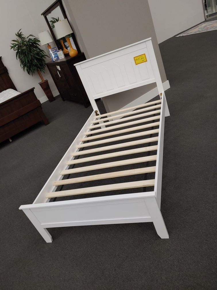 White twin platform bed