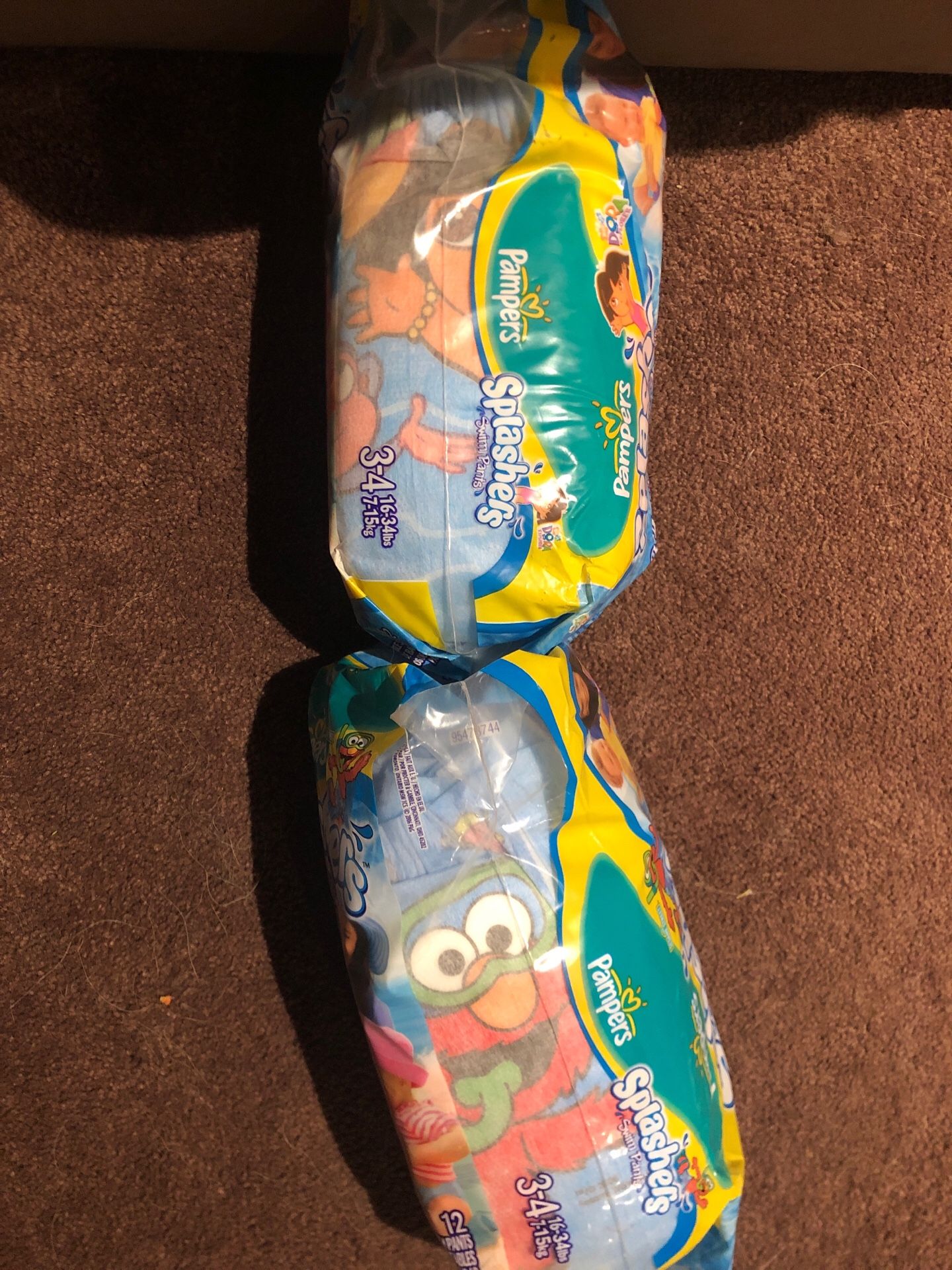 Pampers swim diapers size 3-4 12 each back (they come together)