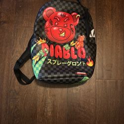 spray ground book bag 