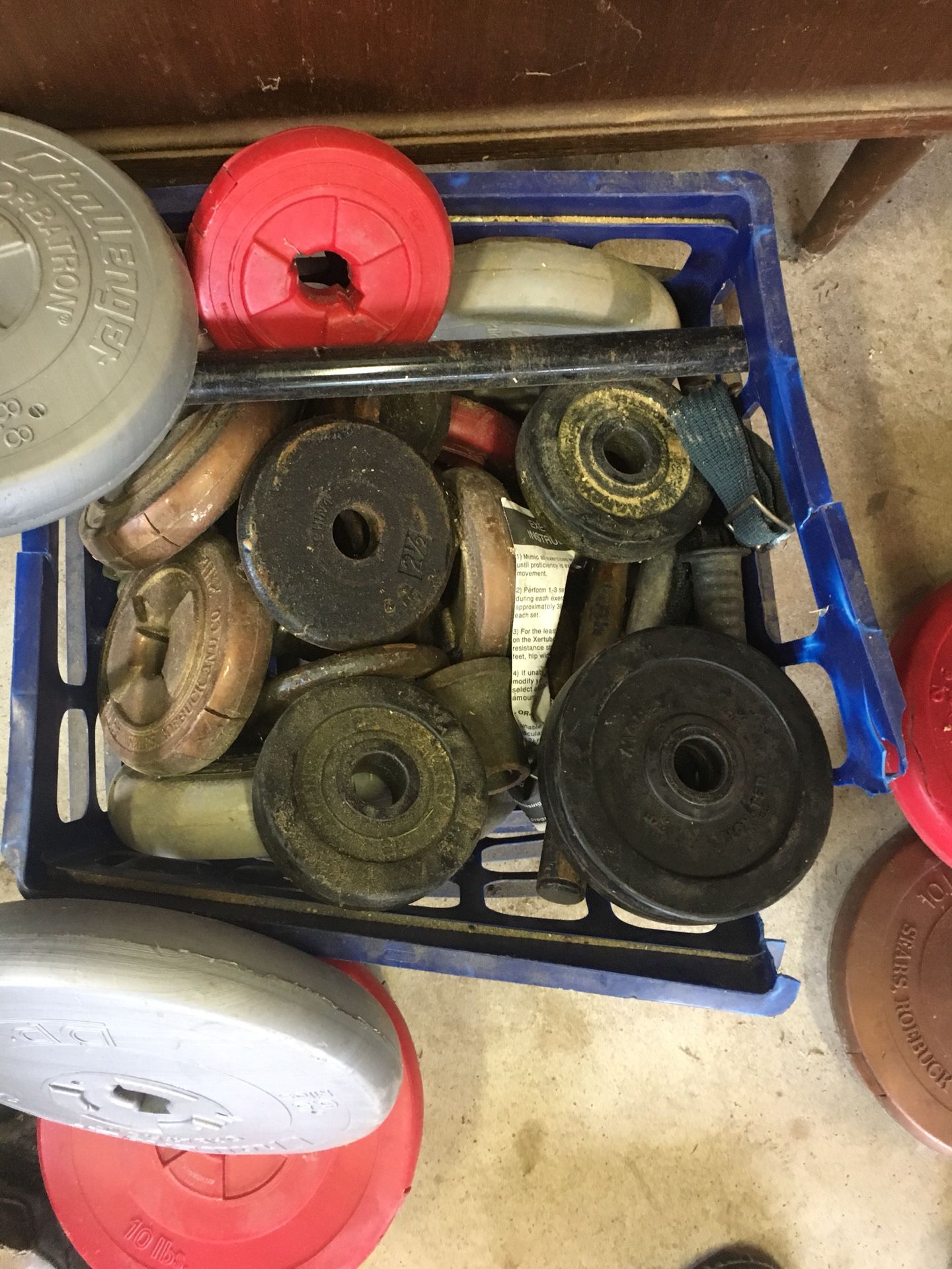 Weights assorted with bar and dumbbells and locks