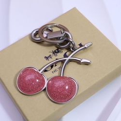 Coach Pink Cherry Keychain
