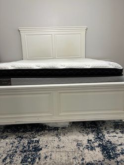$300 OBO - Queen Mattress and bed with end tables