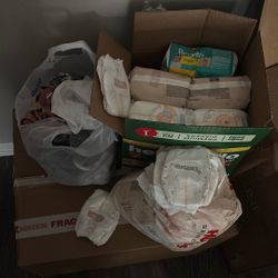 Newborn Clothes And Diapers