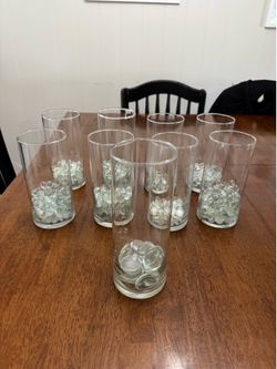 9 cylindrical vases
