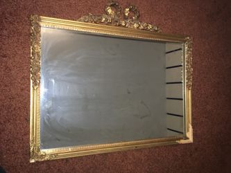 Vintage ornate floral mirror