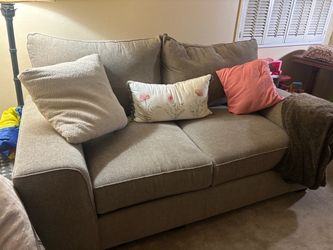 Large comfortable tan love seat