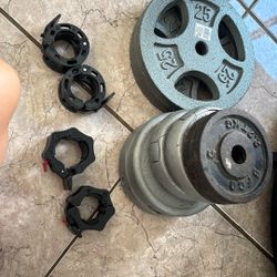 2x25lb , 2x 4.4lb, 2x8lbs, 2x2.2lbs, 2 Sets Of Barbell Collars 
