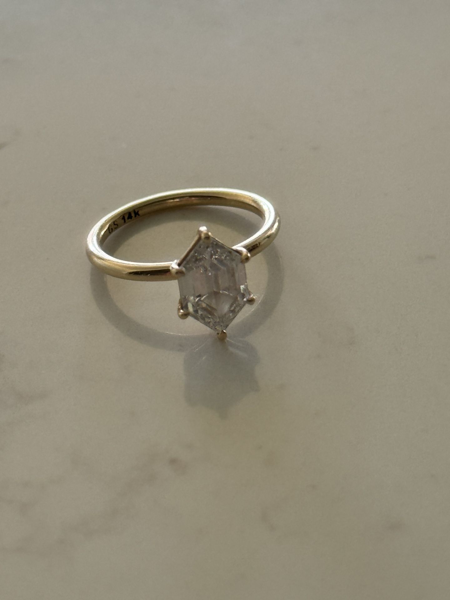Elongated Hexagon Cut diamond engagement ring