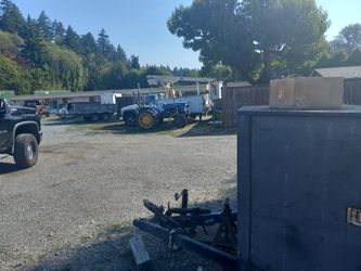 Tractor This Is A Great Tractor To Use Around The Property It Comes With Two Attachments