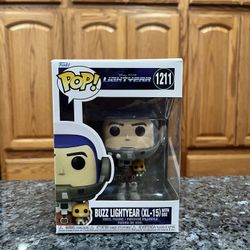Toy Vinyl Funko Pop # 1211 Disney Buzz Lightyear XL-15.  Brand new factory sealed.  Smoke free home 