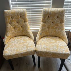Two Yellow Floral Tufted Chairs