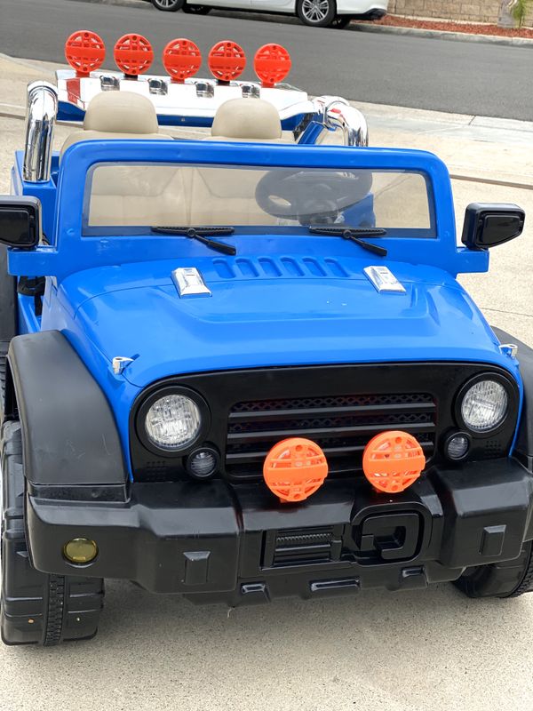 Blue Jeep 12volt electric kids ride on cars power wheels for Sale in