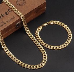 New 18 k yellow gold Cuban chain and bracelet