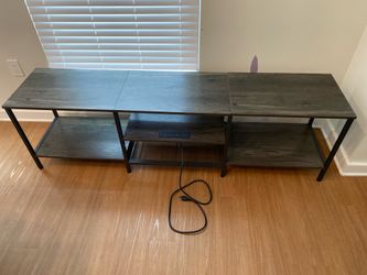 TV Stand 71 inches in Excellent condition with power outlet