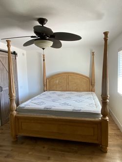 King bed frame and mattress.