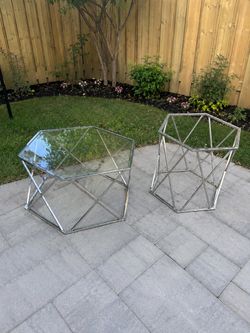 Glass/metal coffee tables
