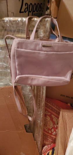 Nice rose pink bag with long strap, very nice.