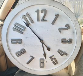 Nice rustic wall clock. 23 1/2 inches wide and 23 1/2 inches tall