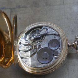 VINTAGE ROCKFORD 14KT GOLD POCKET WATCH 23 JEWELS 66. 8 grams total weight  double roller adjusted 5 positions. good condition. watch was just clean, 