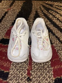 Good condition white and pink K-Swiss baby shoes size 2