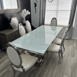 Large And Pretty Dining Room With 4 Chairs