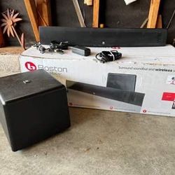 Boston Acoustics TVee Model 25 home theater sound system featuring surround soundbar and wireless subwoofer