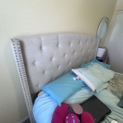 Queen bed, boxspring, mattress, nightstand, lamp, and wall mirror included