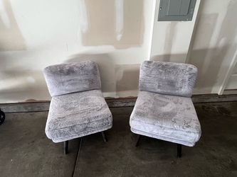 2 light grey chairs