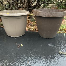 Two matching planter buckets 